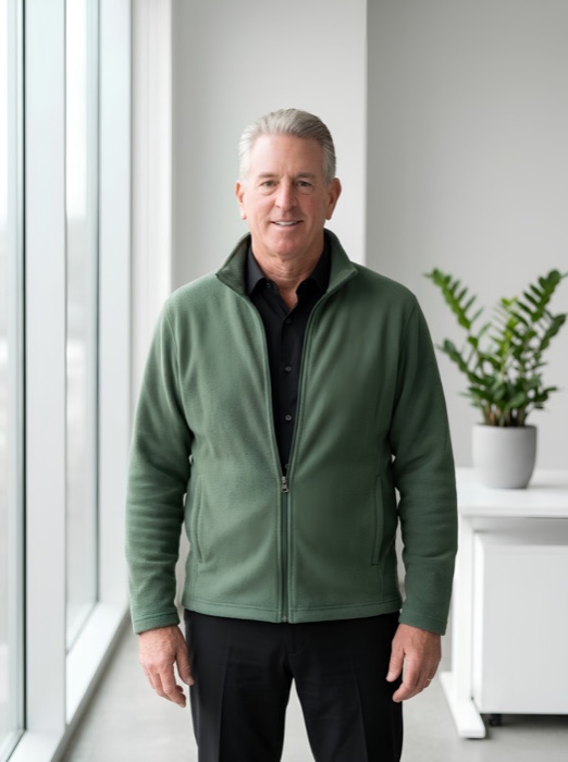 Wayne Quinn, CentreMove co-founder, standing in an office.